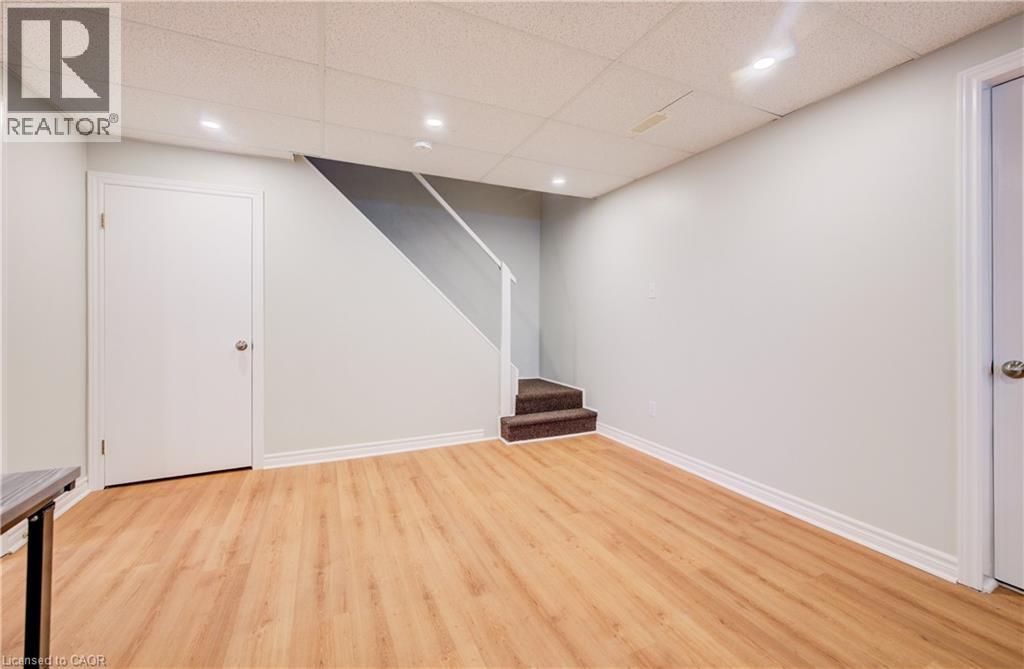 Rec Room in this carpet-free home. - 63 Kingston Crescent, Kitchener, ON - Indoor Photo Showing Other Room