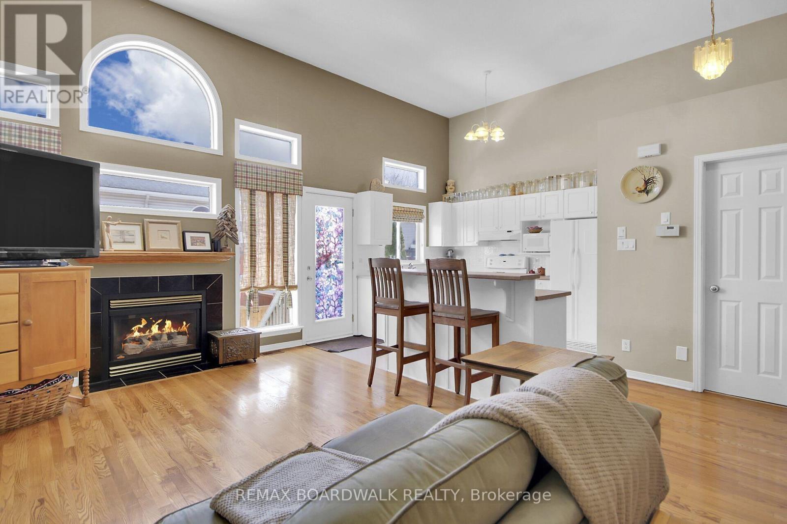 5 Maple Park Private, Ottawa, ON - Indoor Photo Showing Living Room With Fireplace
