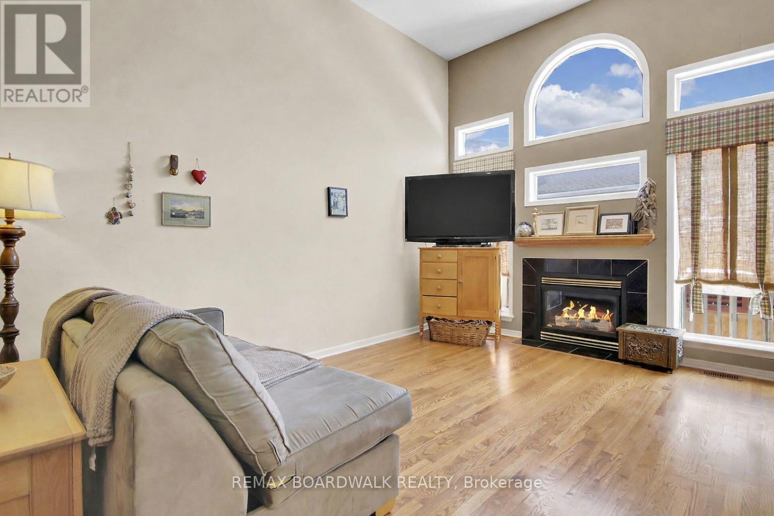 5 Maple Park Private, Ottawa, ON - Indoor Photo Showing Living Room With Fireplace