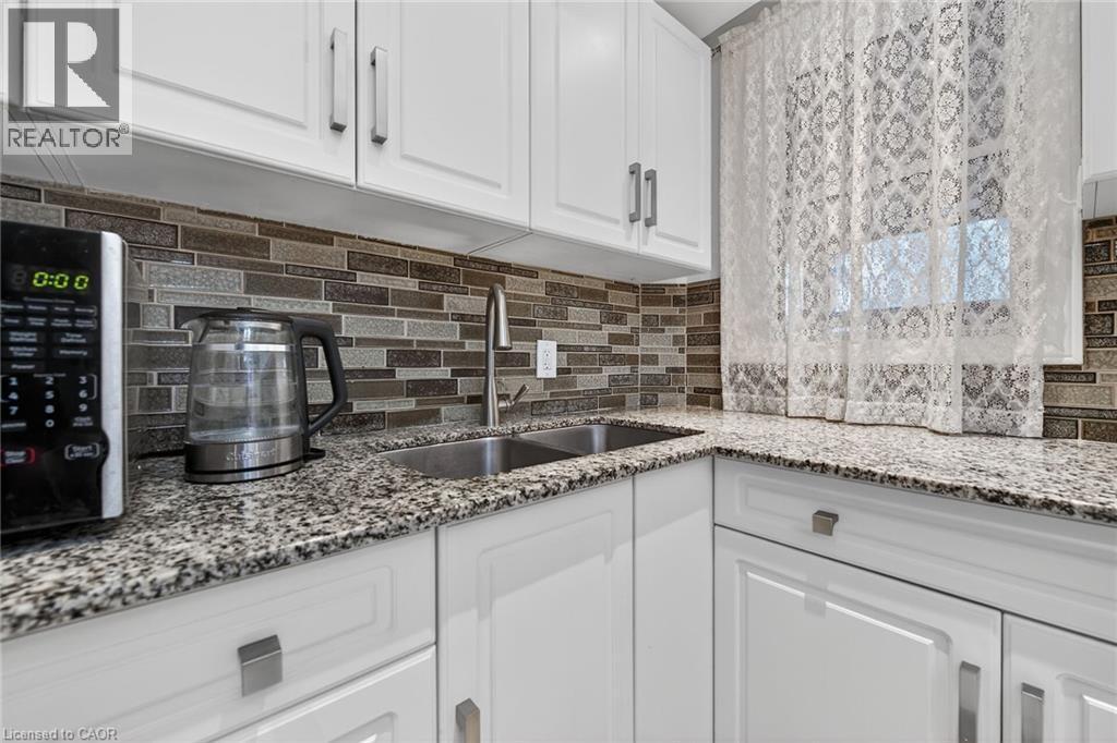 96 Wentworth Street N, Hamilton, ON - Indoor Photo Showing Kitchen With Double Sink With Upgraded Kitchen