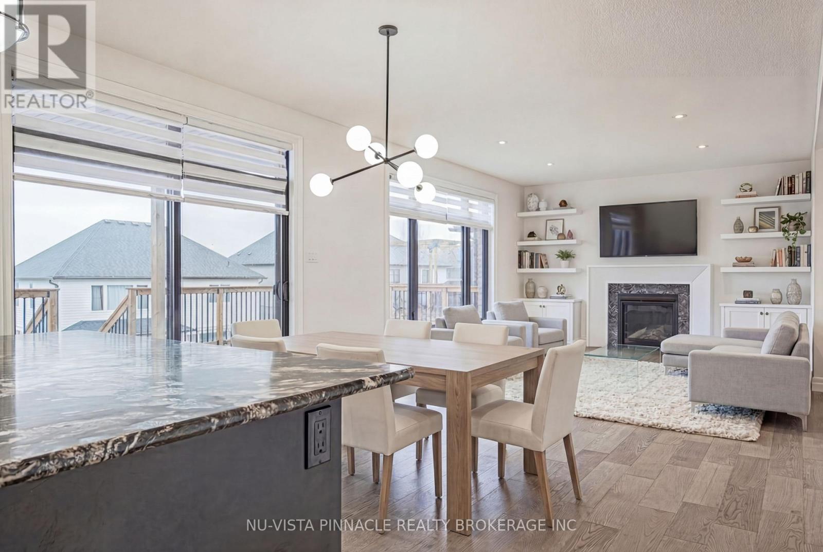 1932 Trailsway Drive, London South (South B), ON - Indoor With Fireplace