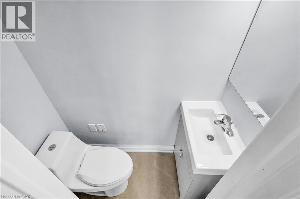 Bathroom with toilet and vanity - 84 Avalon Place, Kitchener, ON - Indoor Photo Showing Bathroom