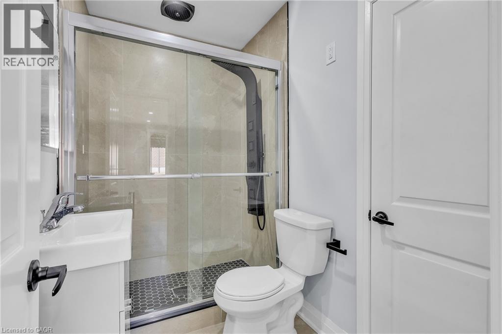 Full bath with vanity and a stall shower - 84 Avalon Place, Kitchener, ON - Indoor Photo Showing Bathroom