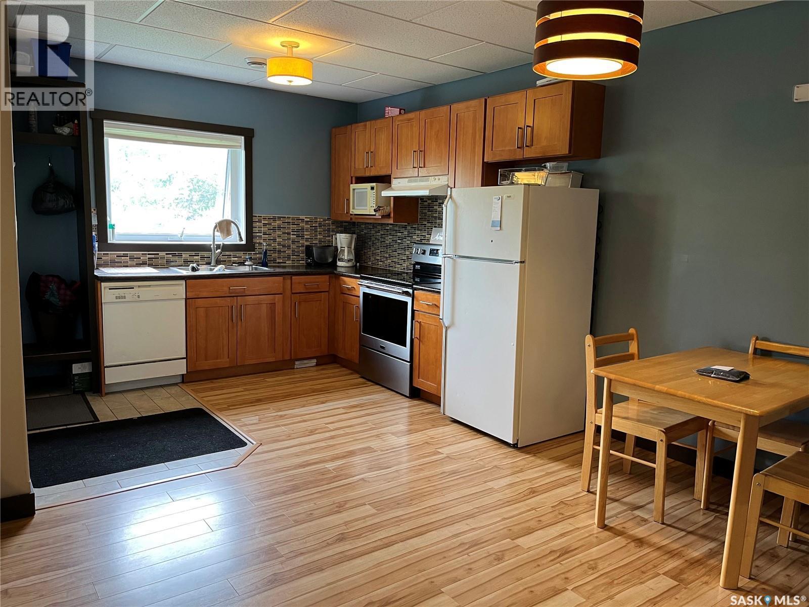 237 Eagle Point Drive, La Ronge, SK - Indoor Photo Showing Kitchen With Double Sink