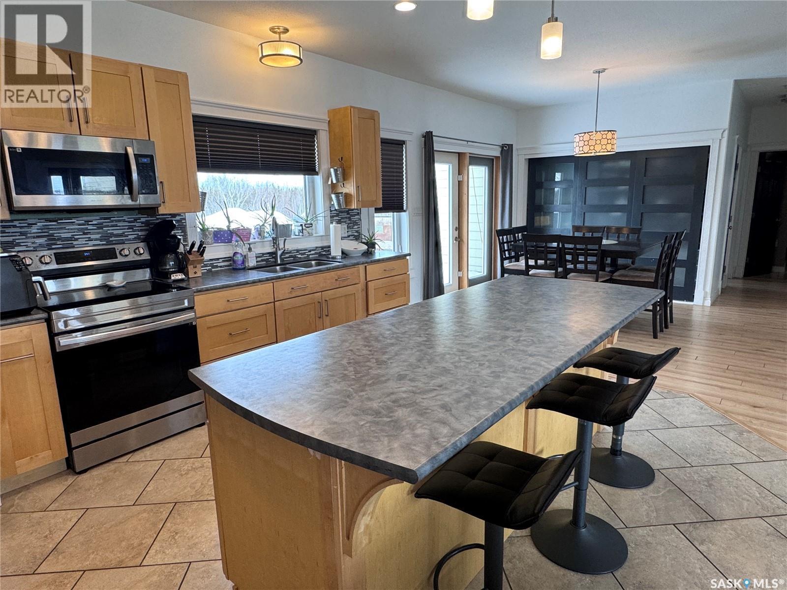 237 Eagle Point Drive, La Ronge, SK - Indoor Photo Showing Kitchen With Double Sink