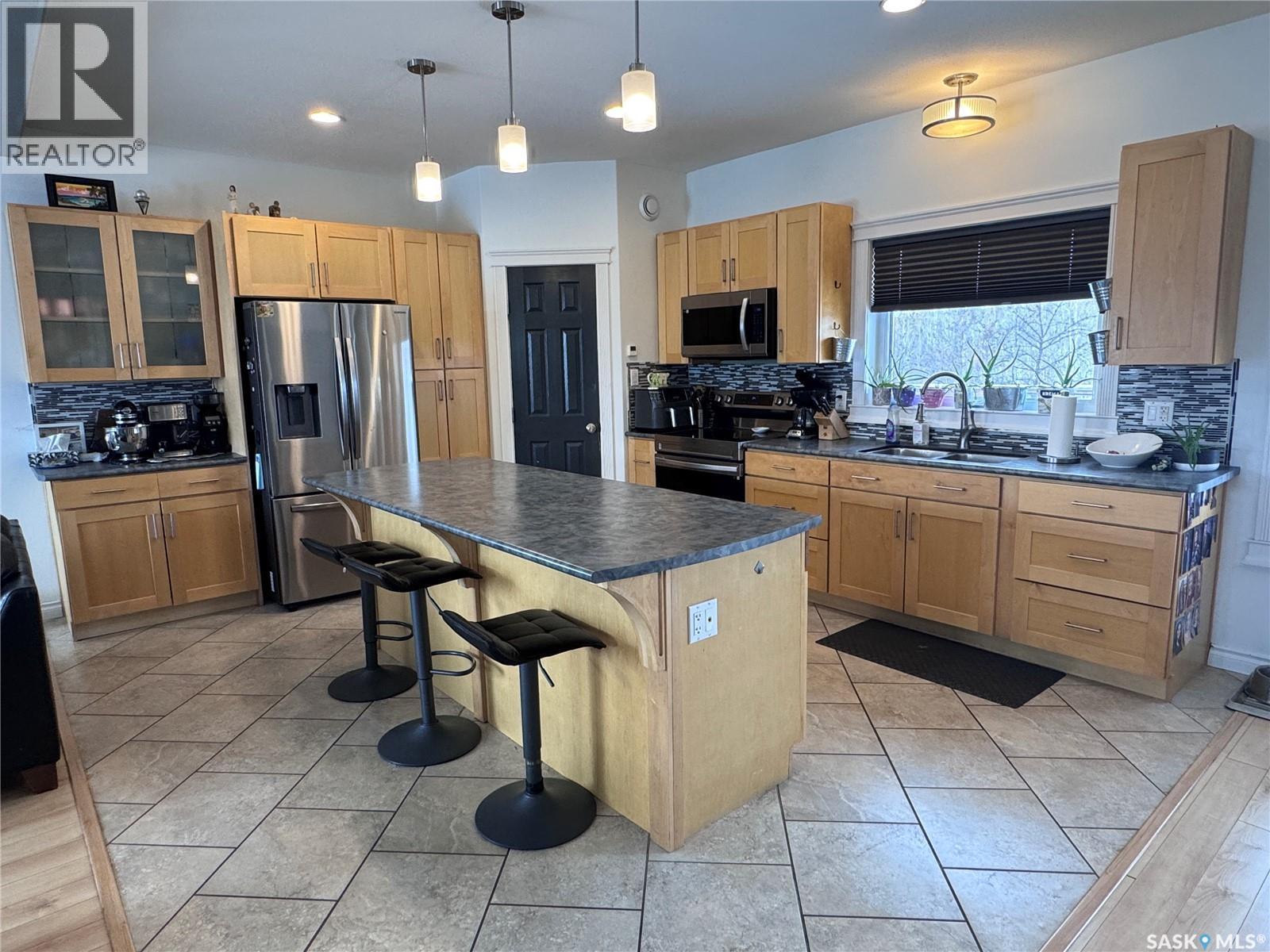 237 Eagle Point Drive, La Ronge, SK - Indoor Photo Showing Kitchen With Double Sink