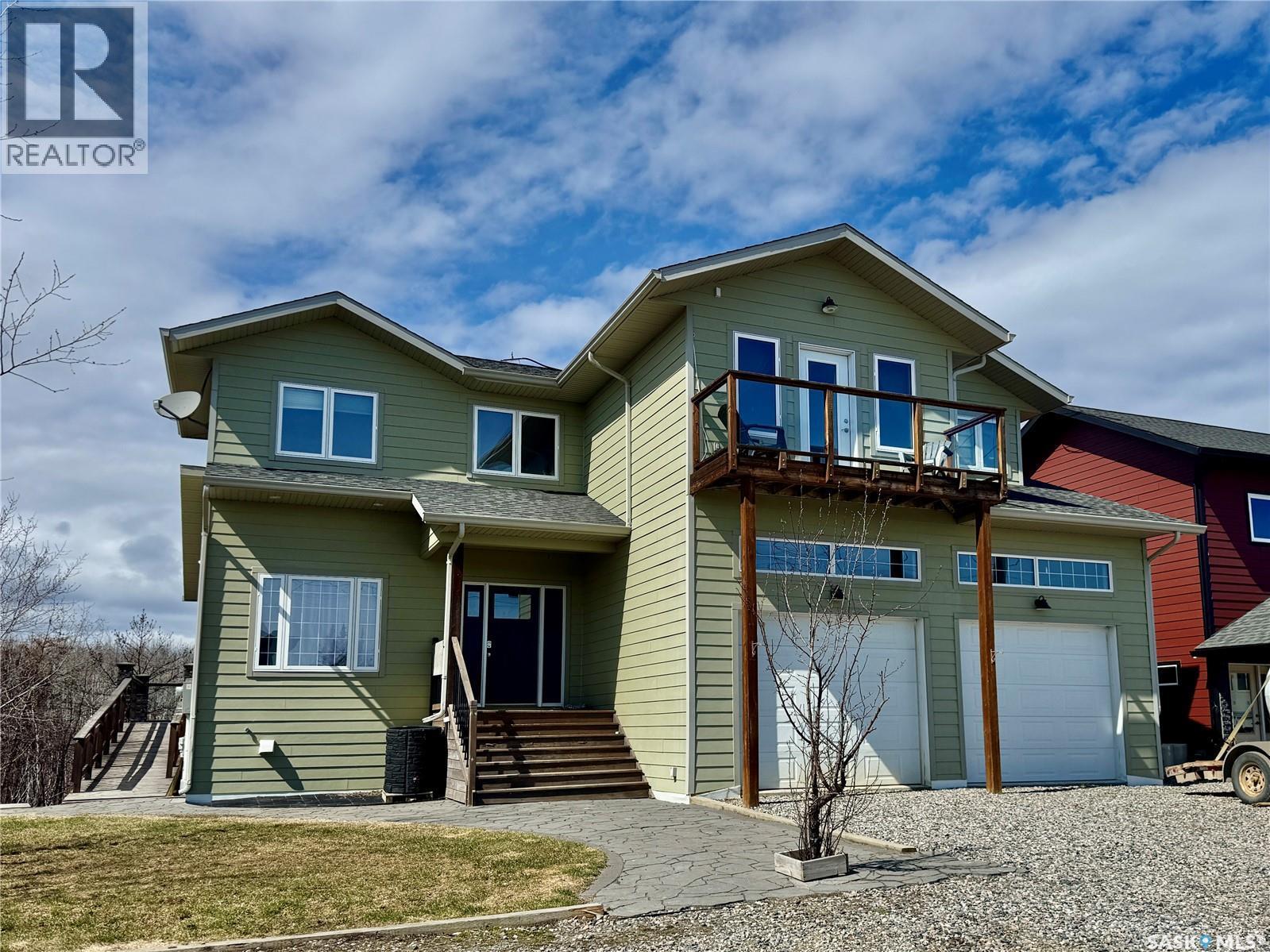 237 Eagle Point Drive, La Ronge, SK - Outdoor With Balcony With Facade
