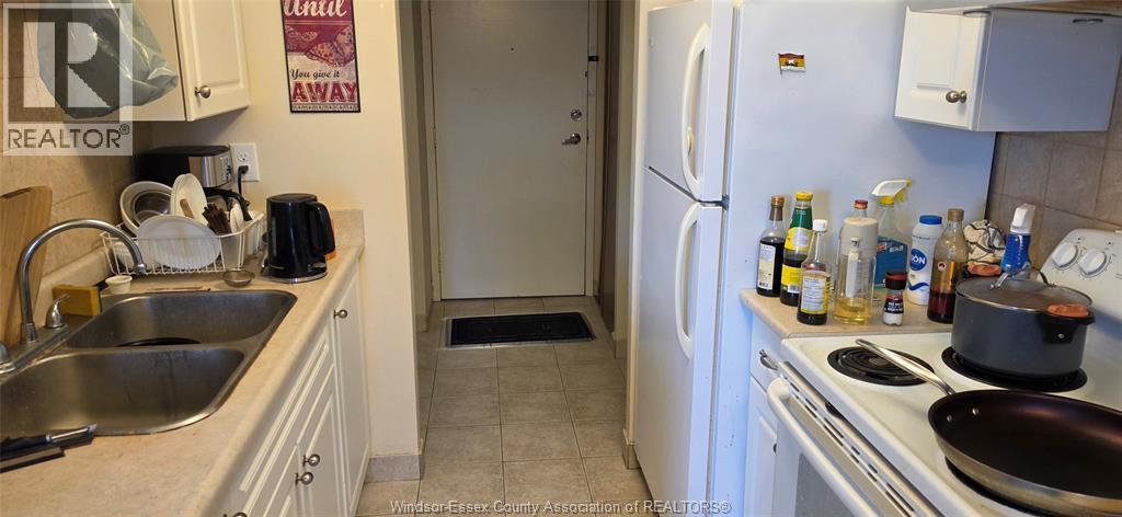 150 Park Unit# 908, Windsor, ON - Indoor Photo Showing Kitchen With Double Sink
