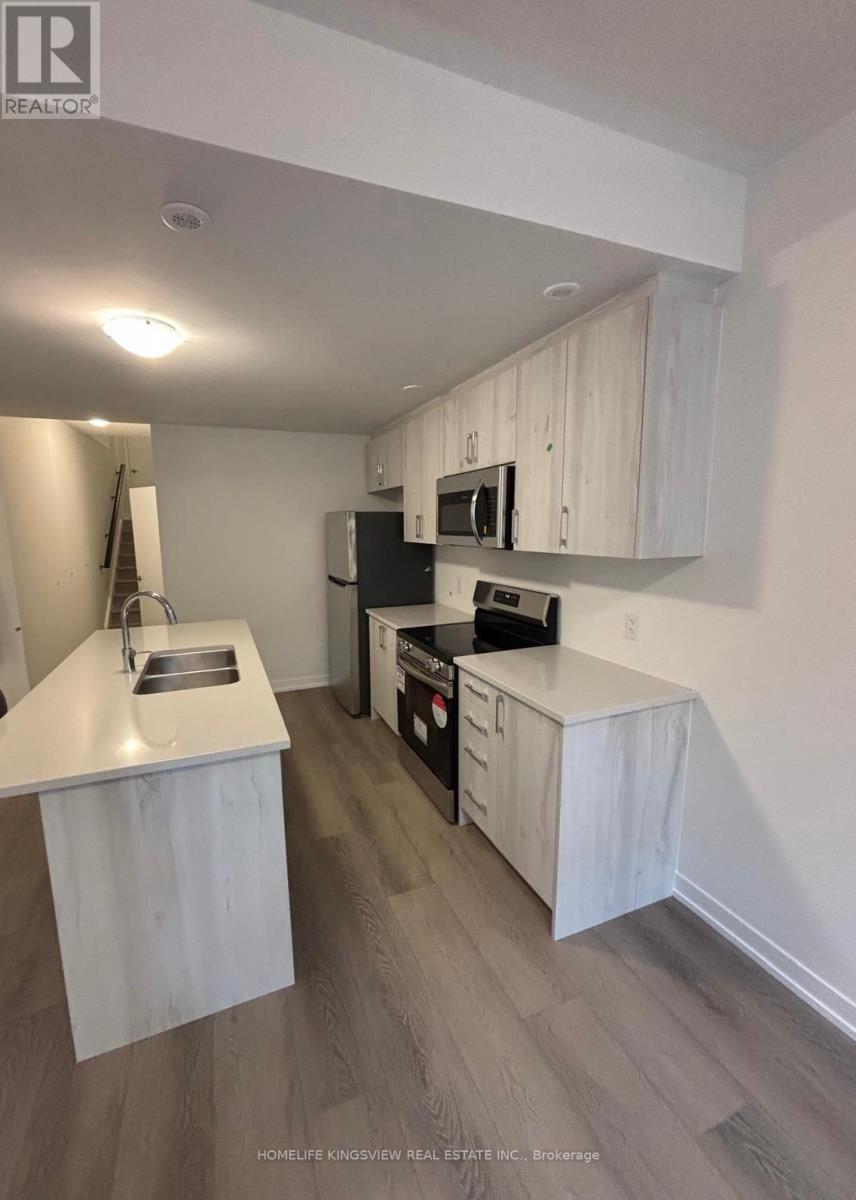 82 Ziibi Way, Clarington, ON - Indoor Photo Showing Kitchen With Stainless Steel Kitchen With Double Sink