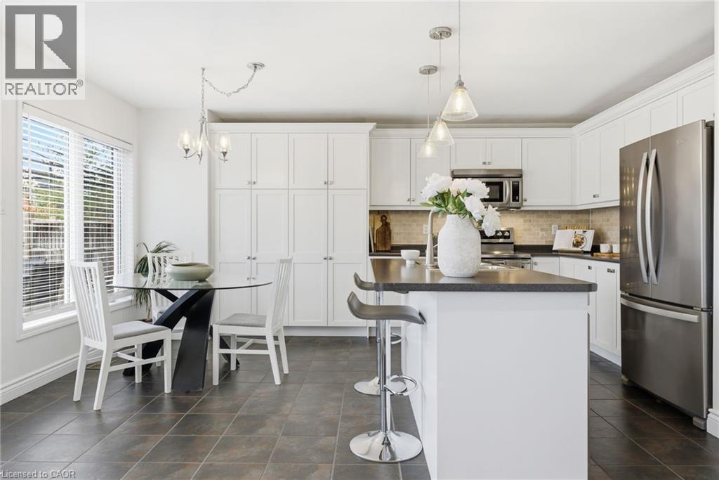 910 Vickerman Way, Milton, ON - Indoor Photo Showing Kitchen With Upgraded Kitchen