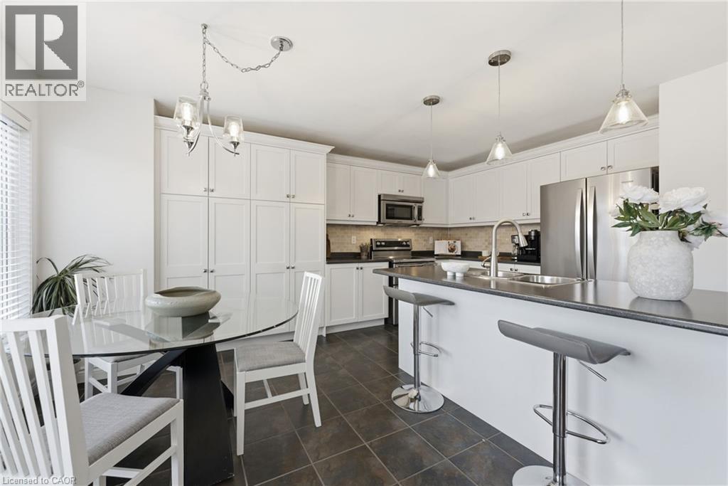 910 Vickerman Way, Milton, ON - Indoor Photo Showing Kitchen With Double Sink With Upgraded Kitchen