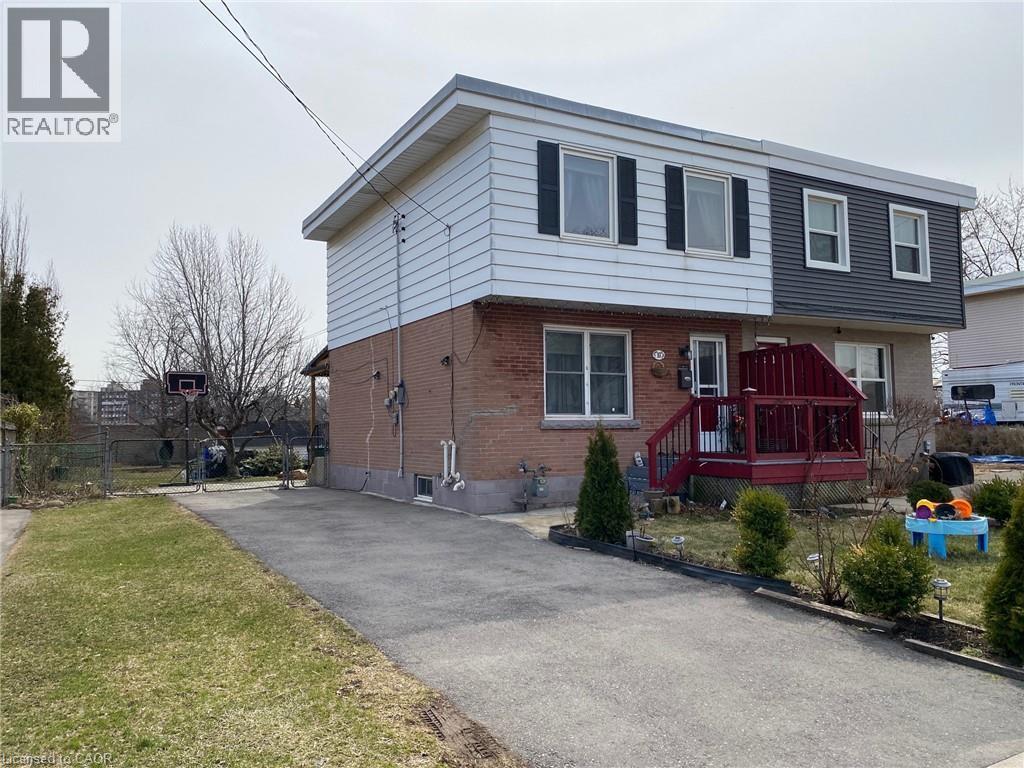View of front of home with brick siding - 10 Armstrong Avenue, Hamilton, ON - Outdoor