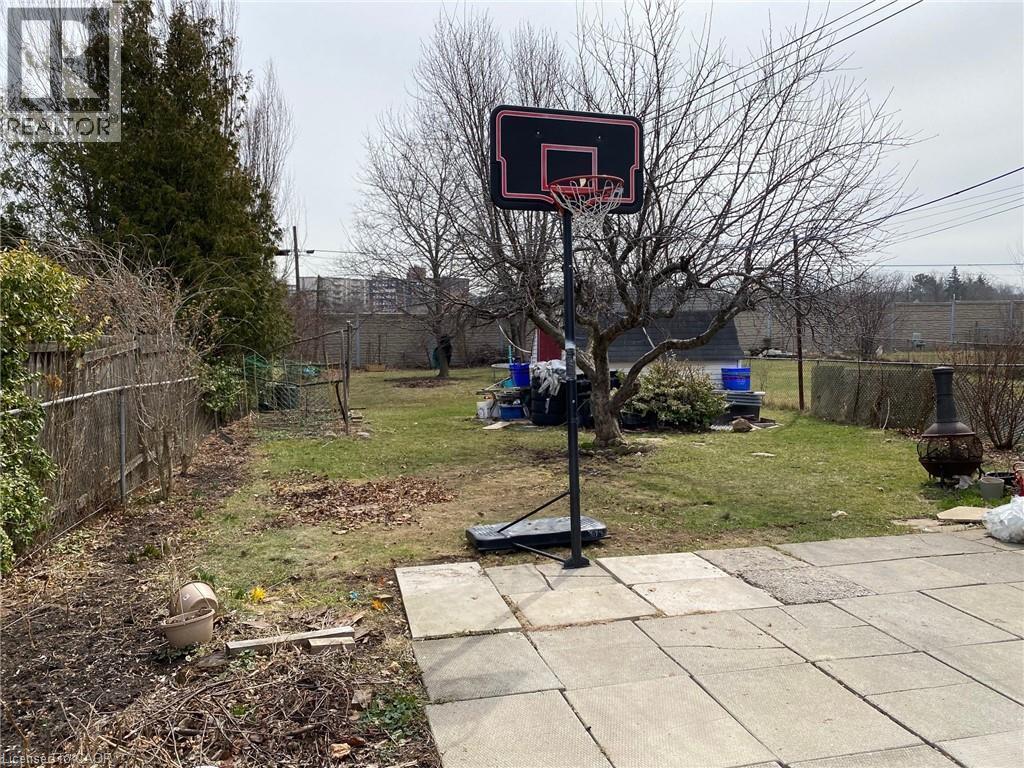 View of fenced backyard - 10 Armstrong Avenue, Hamilton, ON - Outdoor
