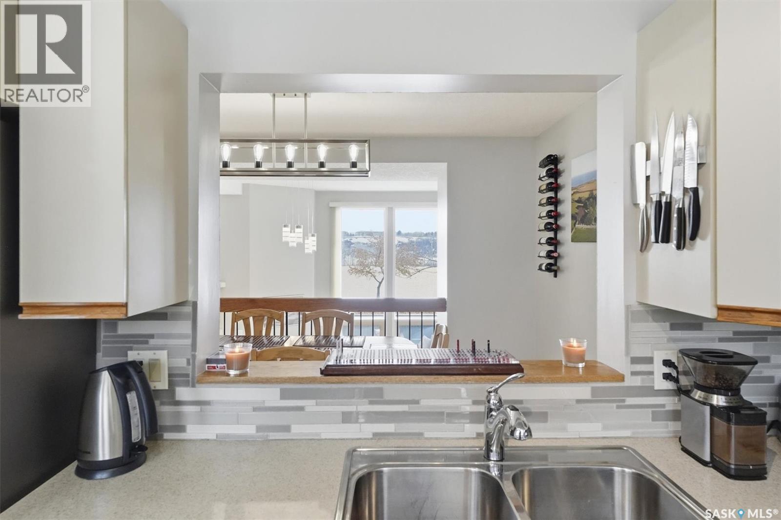 14 455 Pinehouse Drive, Saskatoon, SK - Indoor Photo Showing Kitchen With Double Sink