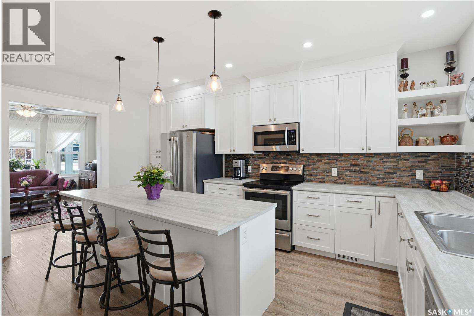 205 3Rd Avenue, Harris, SK - Indoor Photo Showing Kitchen With Double Sink With Upgraded Kitchen