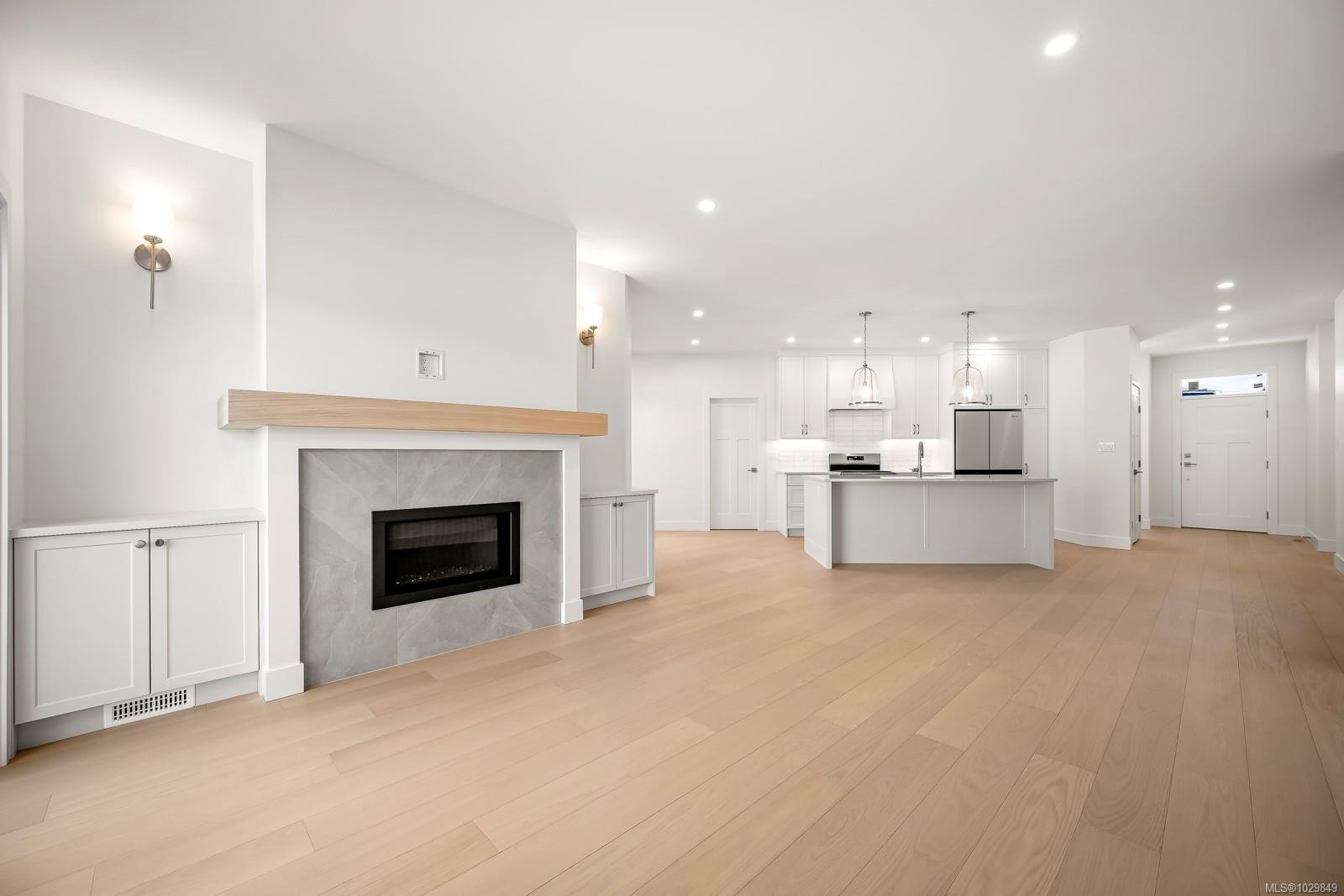 #3-865 Grumman Pl, Comox, BC - Indoor Photo Showing Other Room With Fireplace