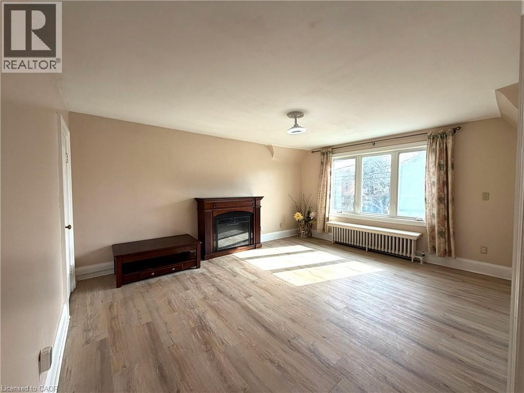 218 Weber Street E, Kitchener, ON - Indoor Photo Showing Living Room With Fireplace