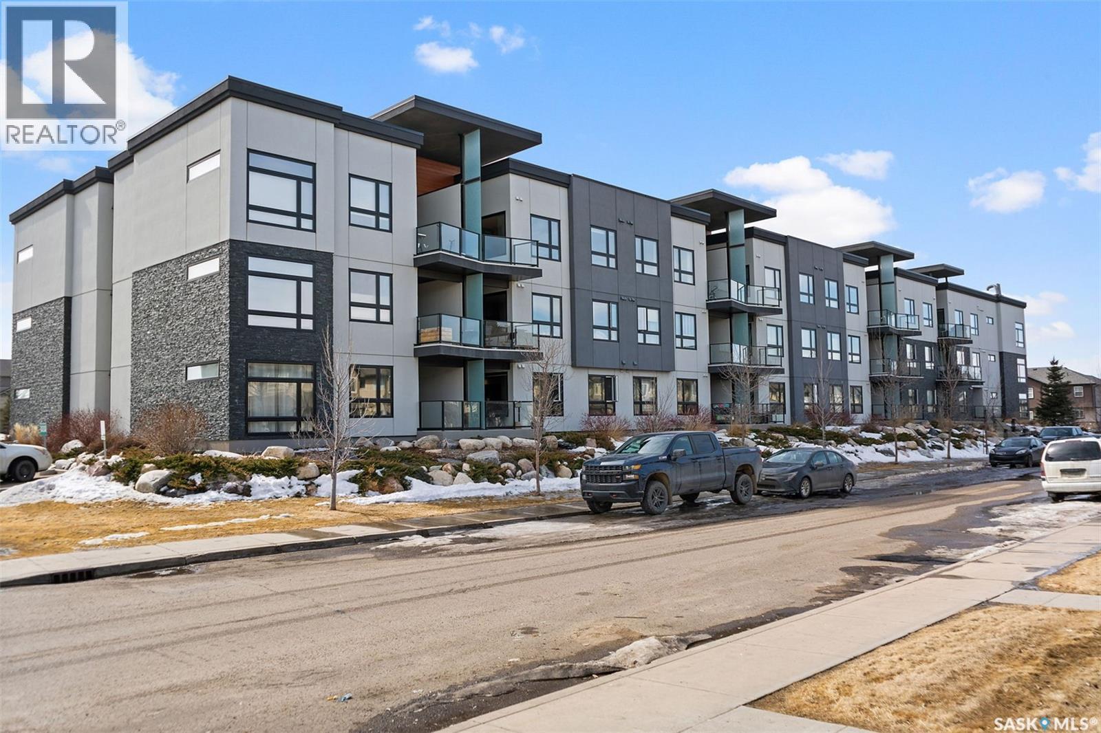 220 225 Maningas Bend, Saskatoon, SK - Outdoor With Balcony With Facade