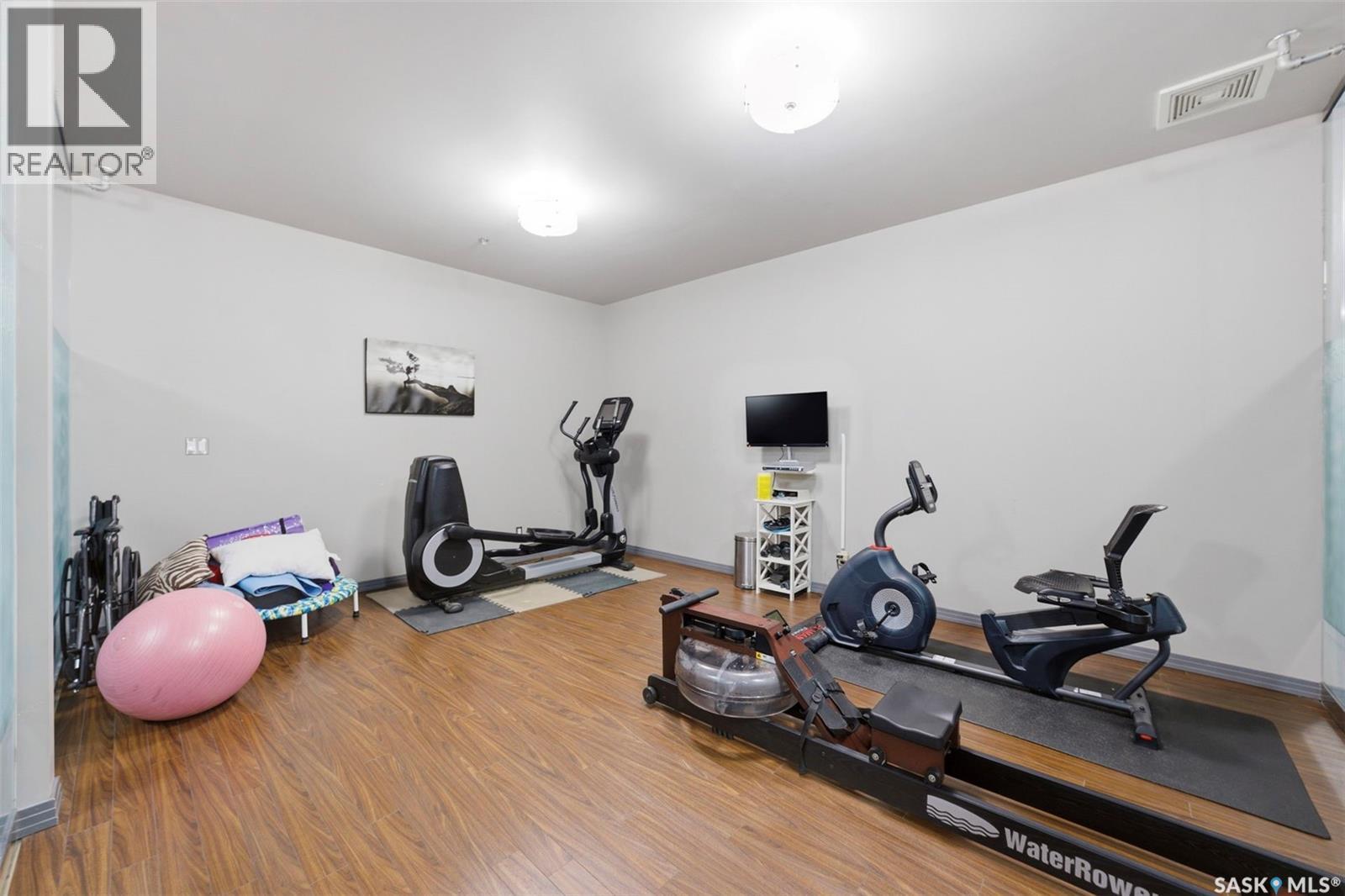 220 225 Maningas Bend, Saskatoon, SK - Indoor Photo Showing Gym Room