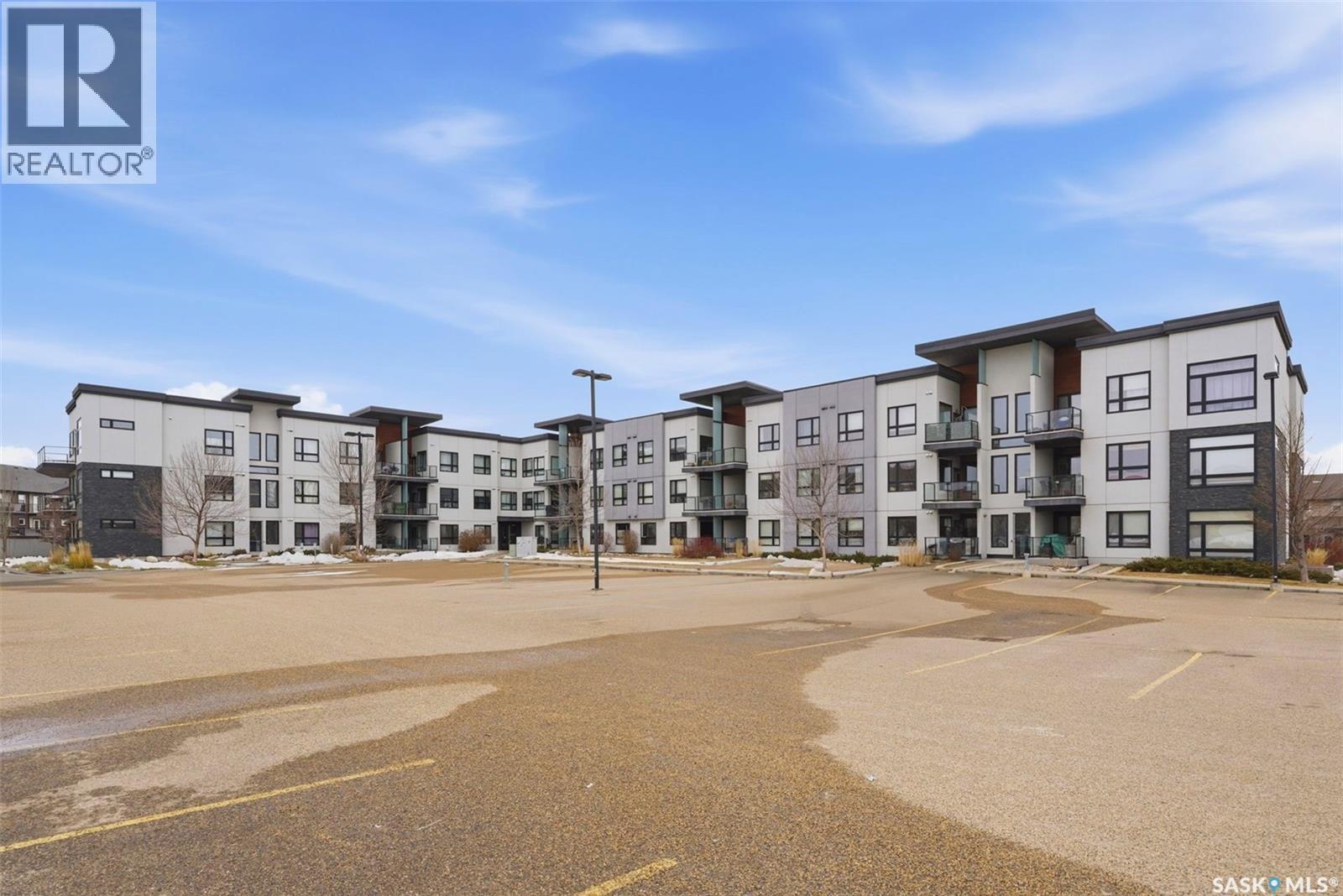 220 225 Maningas Bend, Saskatoon, SK - Outdoor With Balcony With Facade