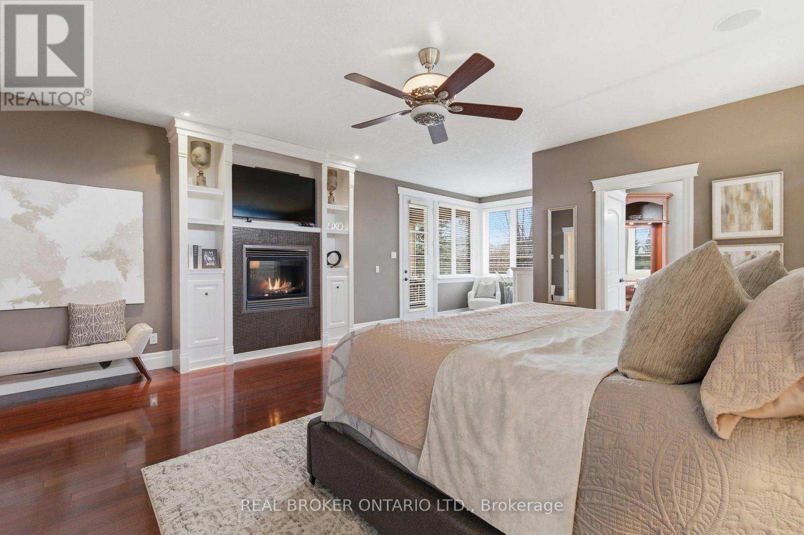 16 Seifert Court, Cambridge, ON - Indoor Photo Showing Bedroom With Fireplace