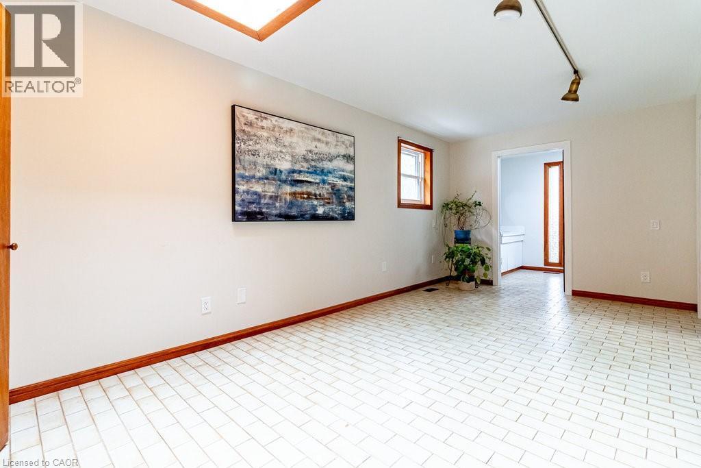 Spare room with baseboards - 218 Bay Street S, Hamilton, ON