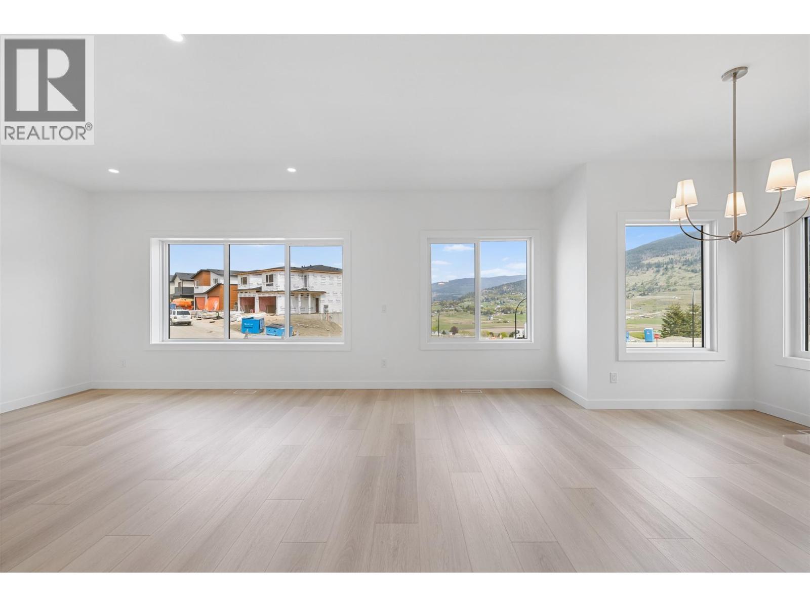 Living/Dining - 442 Arrowleaf Rise, Coldstream, BC - Indoor Photo Showing Other Room