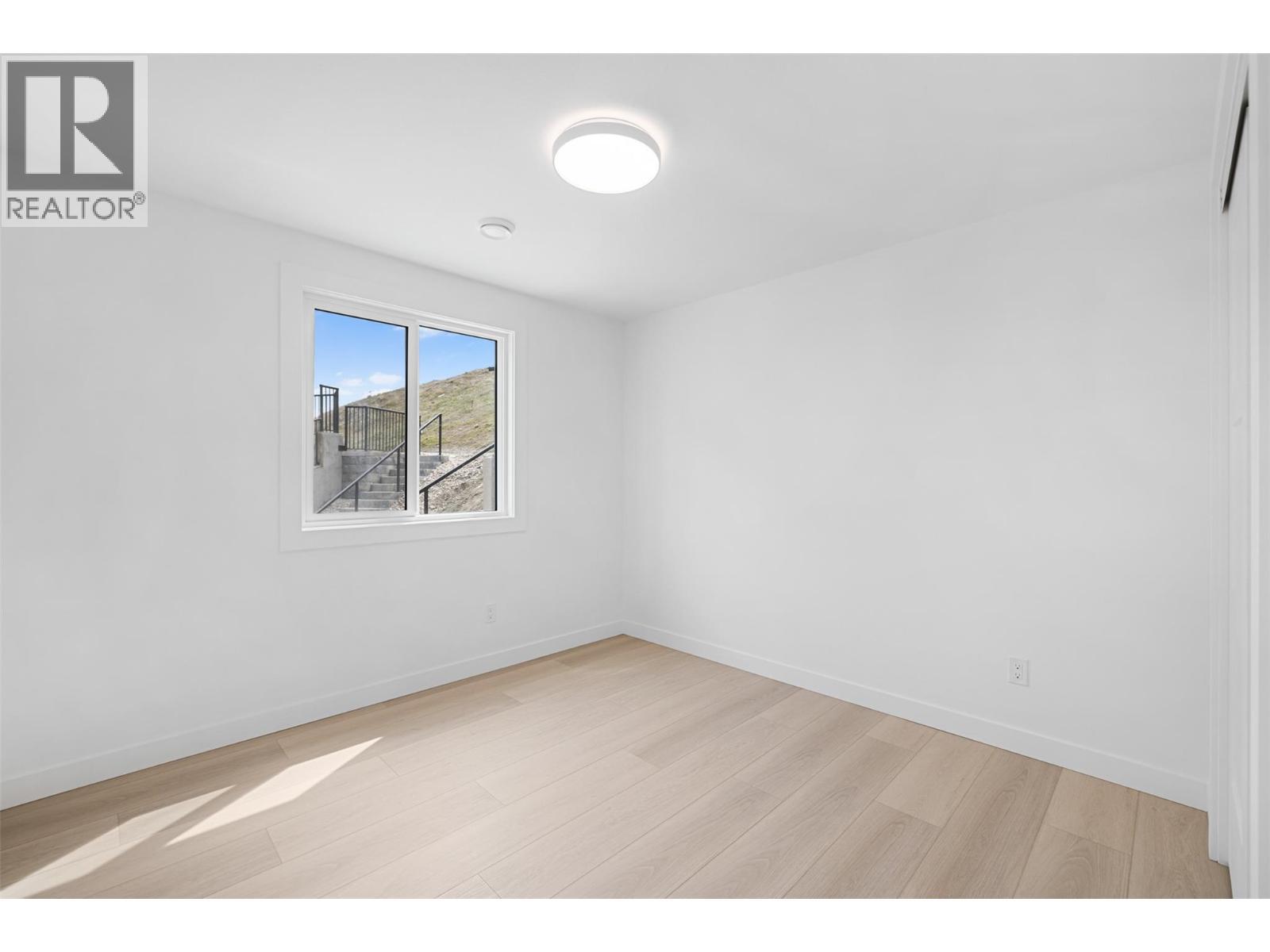 442 Arrowleaf Rise, Coldstream, BC - Indoor Photo Showing Other Room