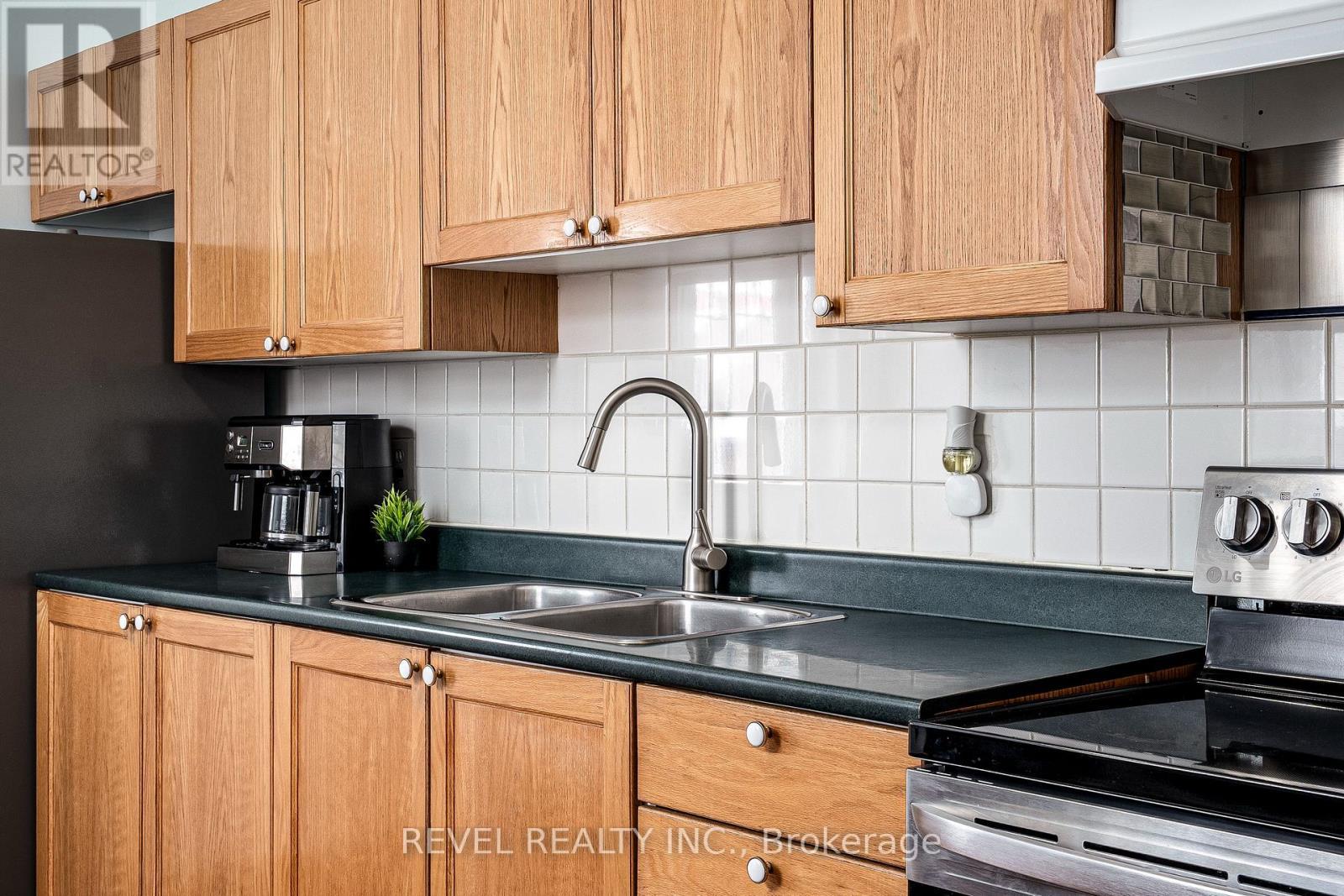 51 Tisdale Street N, Hamilton, ON - Indoor Photo Showing Kitchen With Double Sink