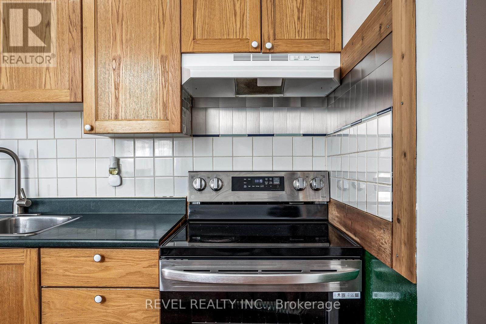 51 Tisdale Street N, Hamilton, ON - Indoor Photo Showing Kitchen With Double Sink