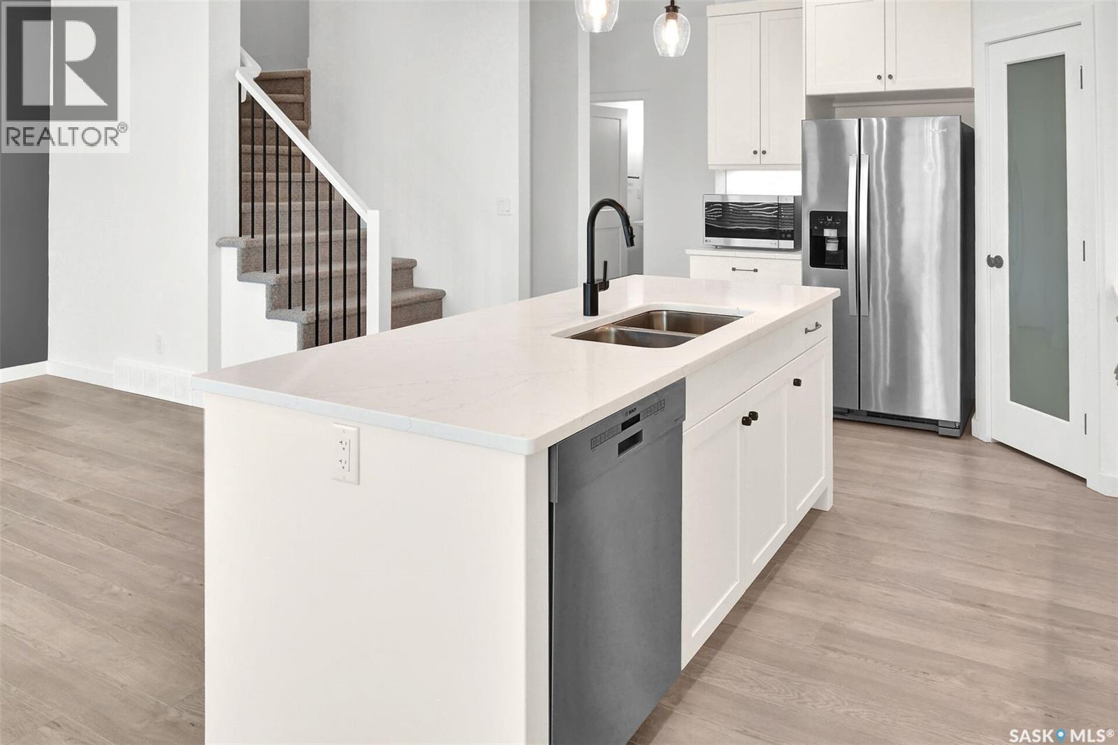 104 Forsey Avenue, Saskatoon, SK - Indoor Photo Showing Kitchen With Double Sink