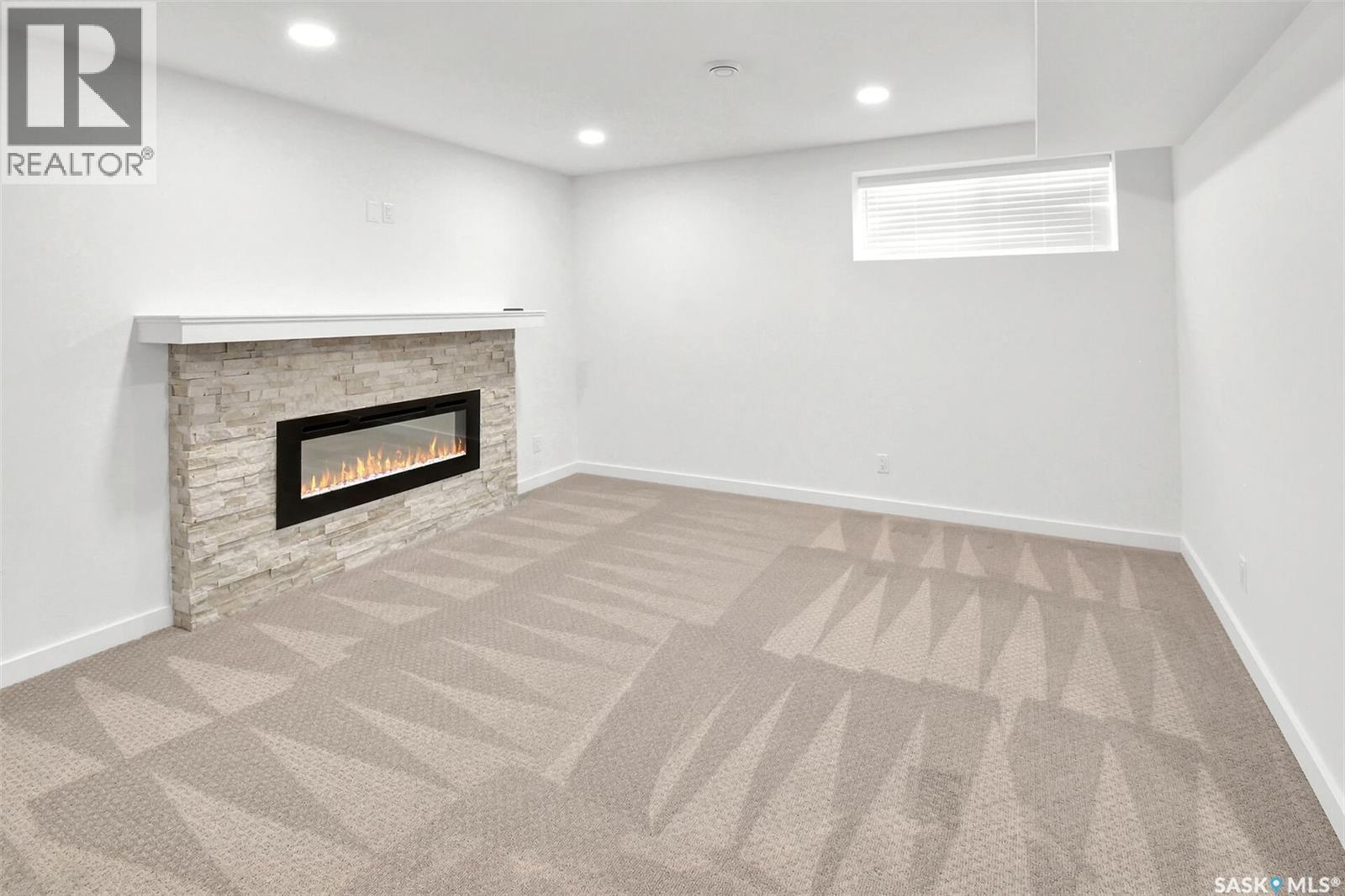 104 Forsey Avenue, Saskatoon, SK - Indoor With Fireplace