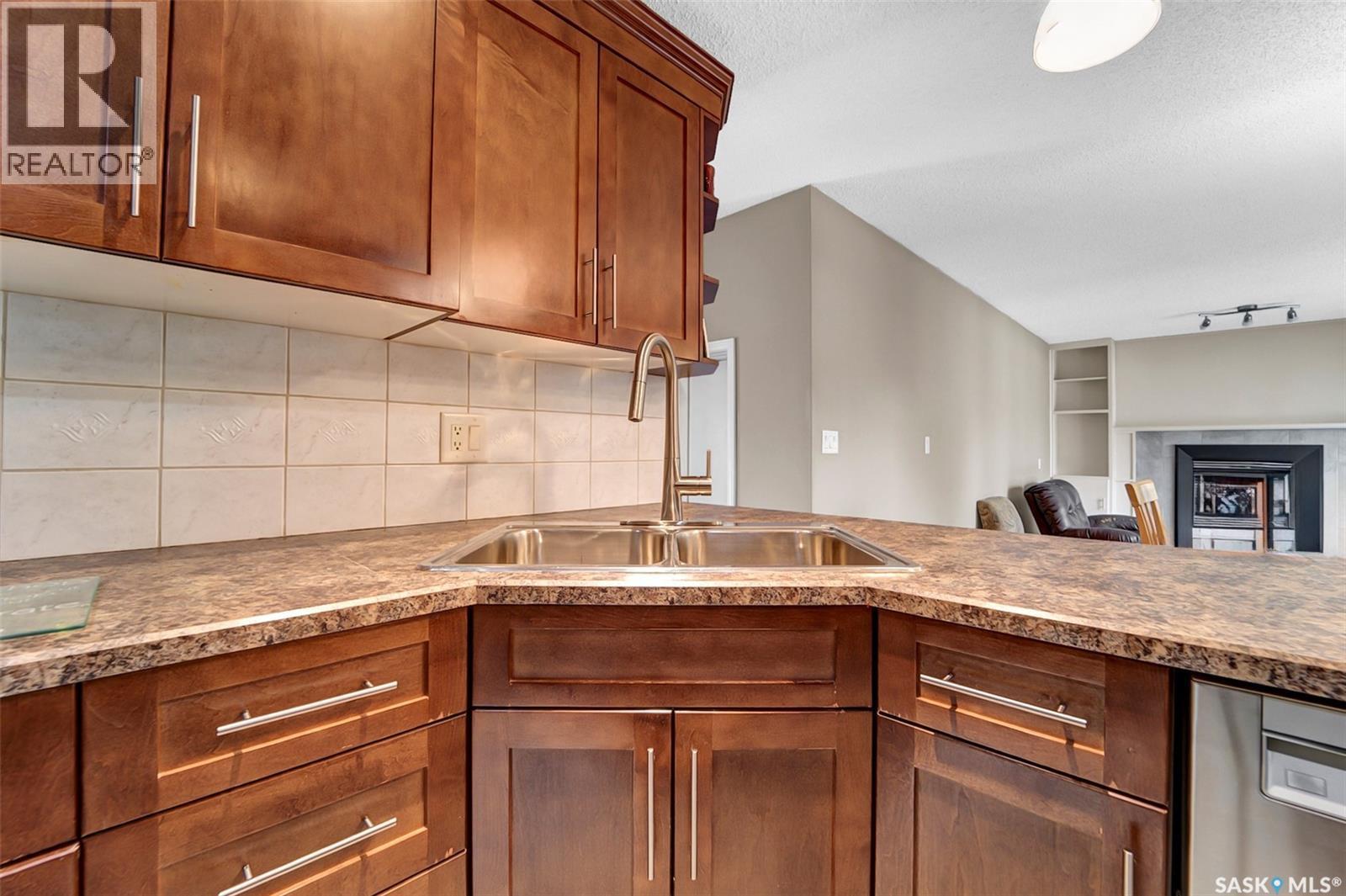 143 Biro Place, Saskatoon, SK - Indoor Photo Showing Kitchen With Double Sink