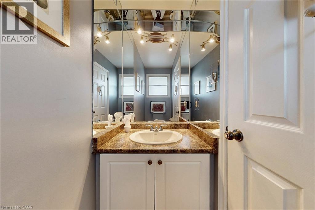 Half bathroom featuring vanity - 62 Como Place, Hamilton, ON - Indoor Photo Showing Bathroom