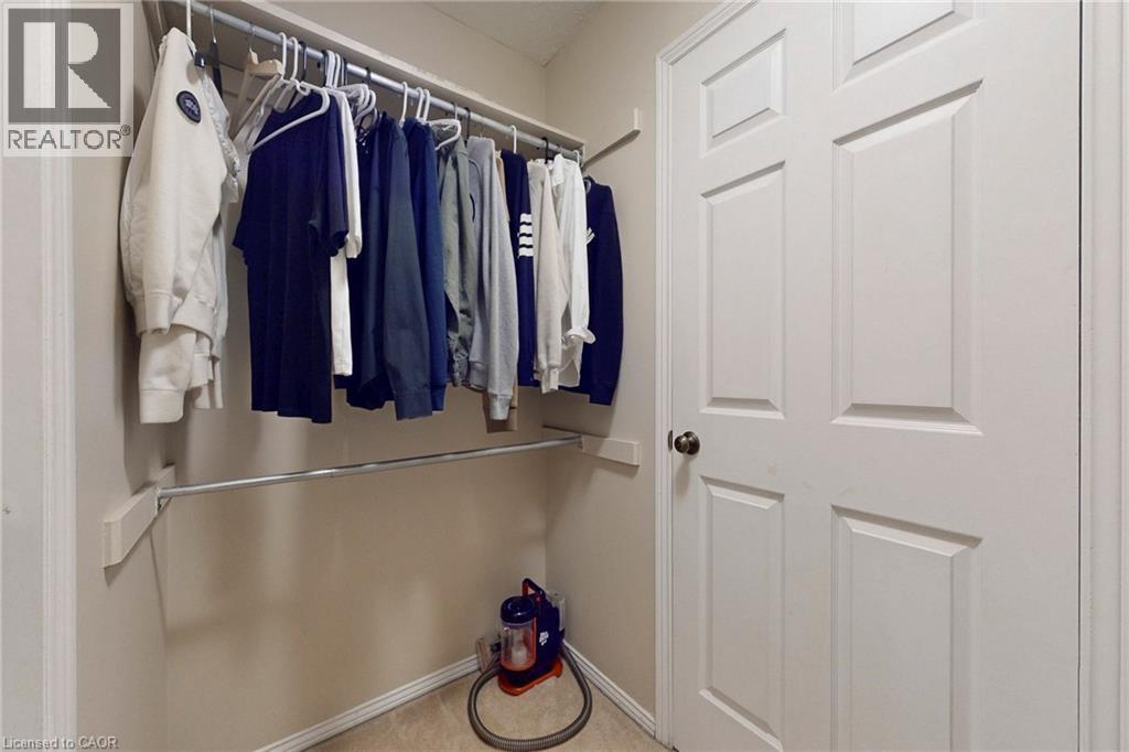 View of walk in closet - 62 Como Place, Hamilton, ON - Indoor With Storage