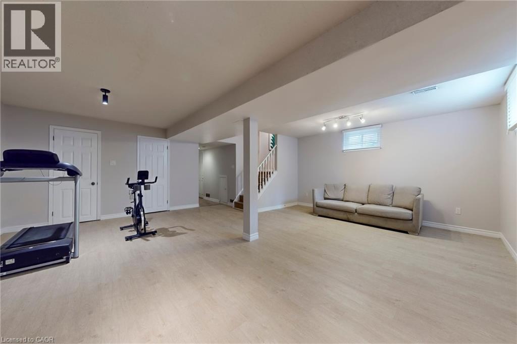 Exercise area with light wood finished floors - 62 Como Place, Hamilton, ON - Indoor