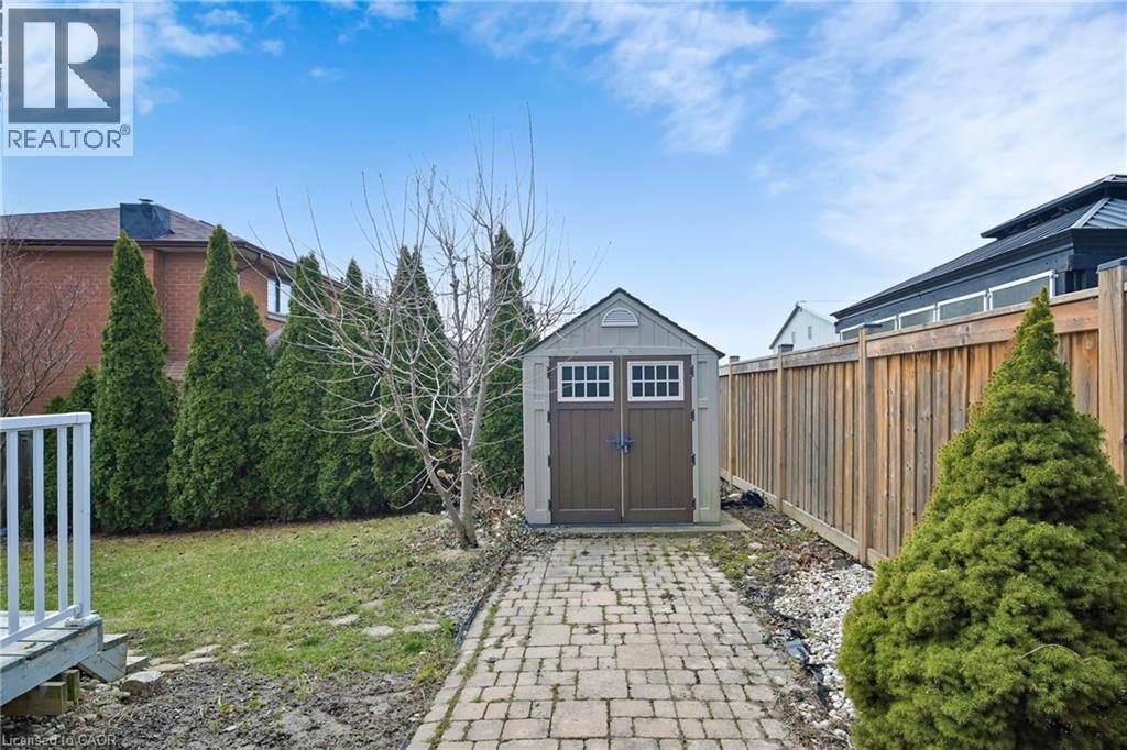 View of shed featuring a fenced backyard - 62 Como Place, Hamilton, ON - Outdoor