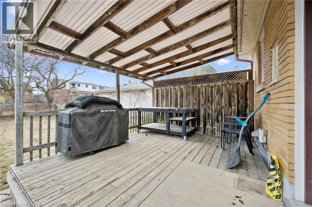 Wooden terrace with area for grilling - 699 Frederick Street, Kitchener, ON - Outdoor With Deck Patio Veranda With Exterior