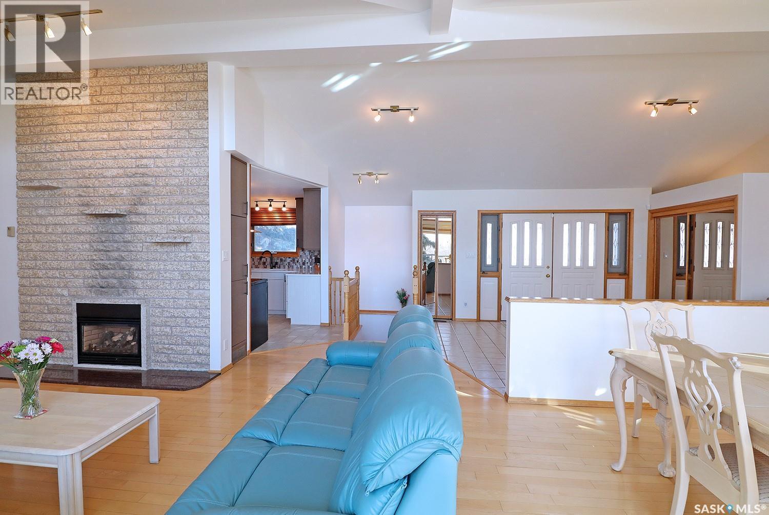 110 Logan Crescent E, Yorkton, SK - Indoor Photo Showing Living Room With Fireplace