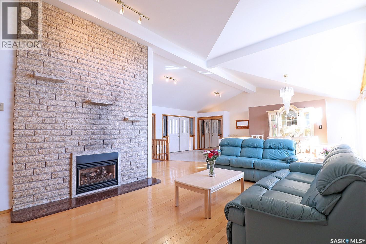 110 Logan Crescent E, Yorkton, SK - Indoor Photo Showing Living Room With Fireplace