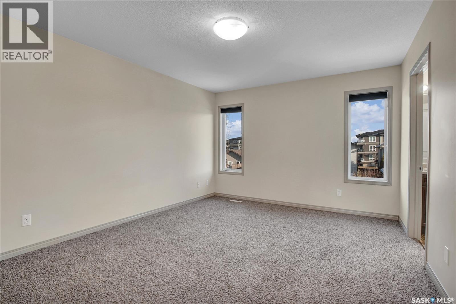 211 Mcbeth Crescent, Saskatoon, SK - Indoor Photo Showing Other Room