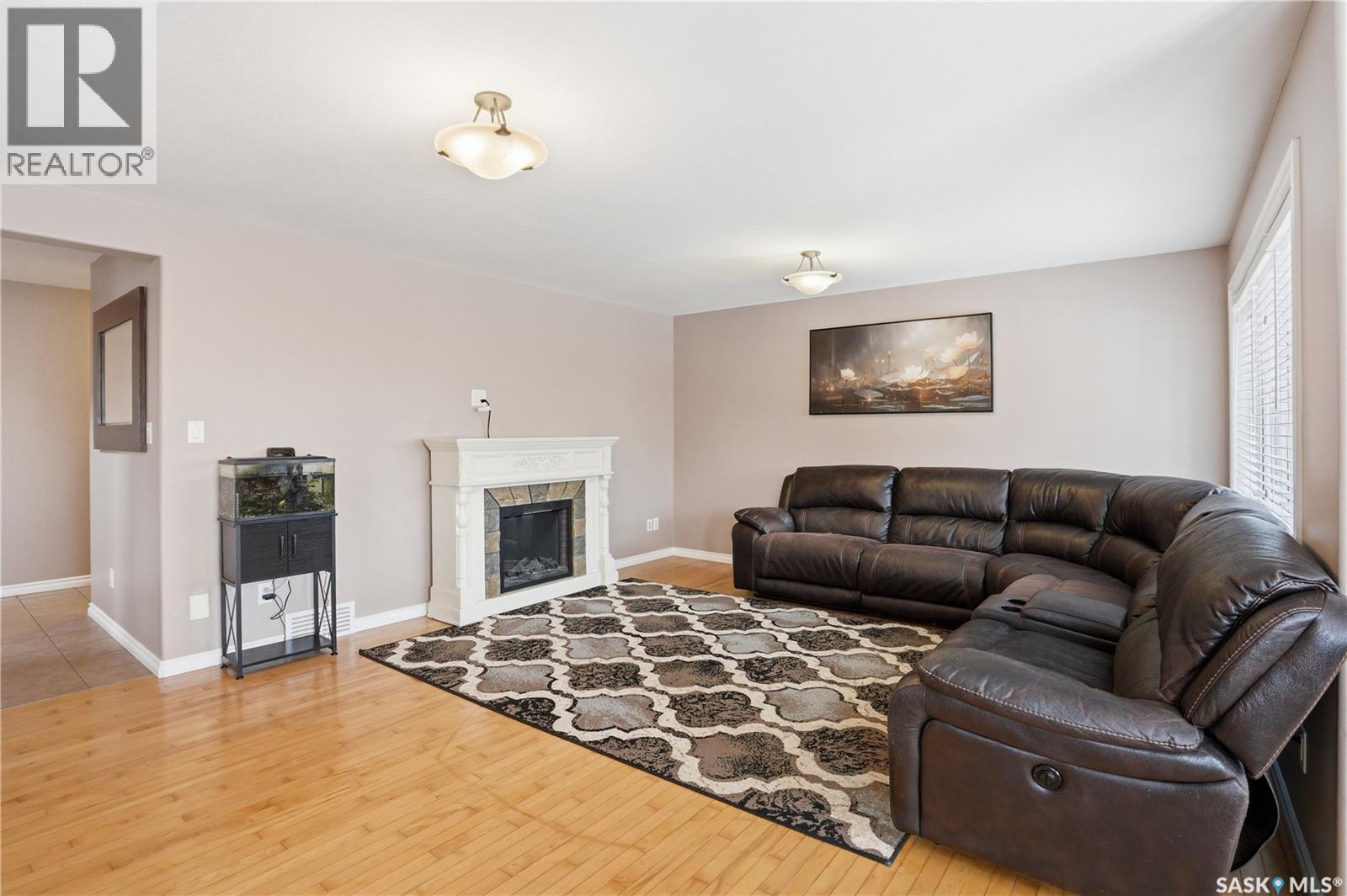 3286 Mcclocklin Road, Saskatoon, SK - Indoor Photo Showing Living Room With Fireplace