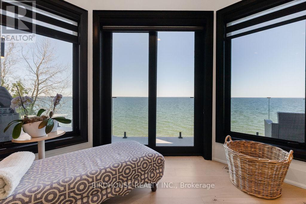 16 & 20 Garden Gate, Brock, ON - Indoor Photo Showing Bedroom With Body Of Water