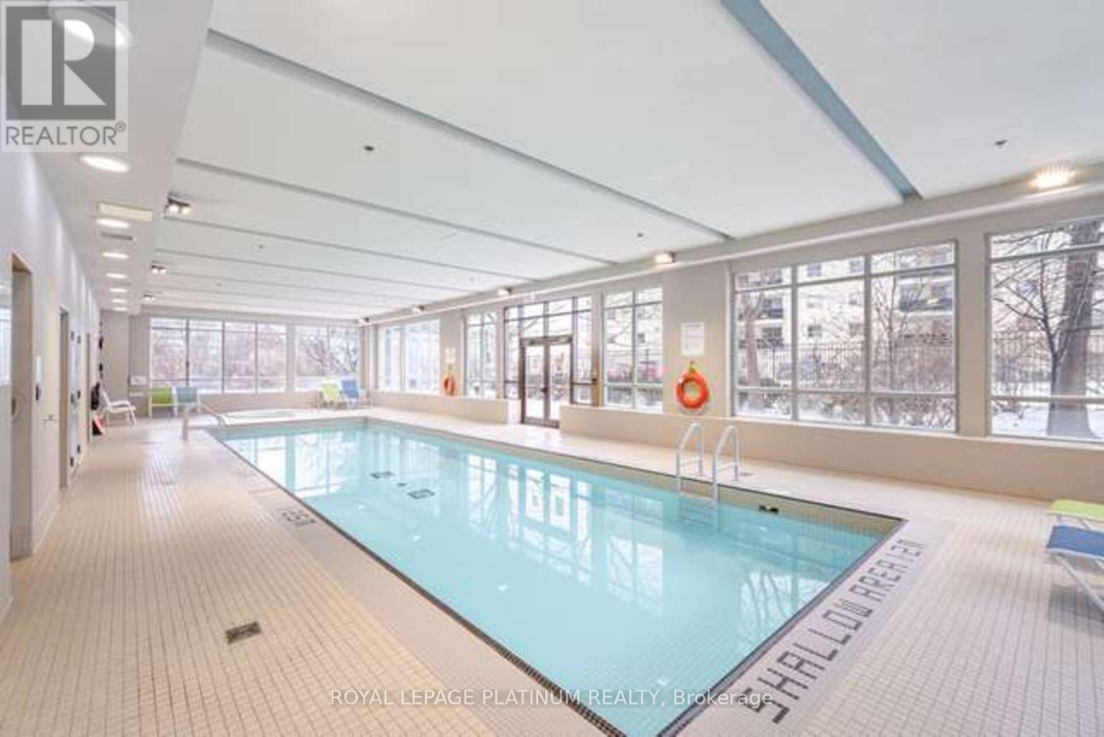 510 - 3515 Kariya Drive, Mississauga, ON - Indoor Photo Showing Other Room With In Ground Pool