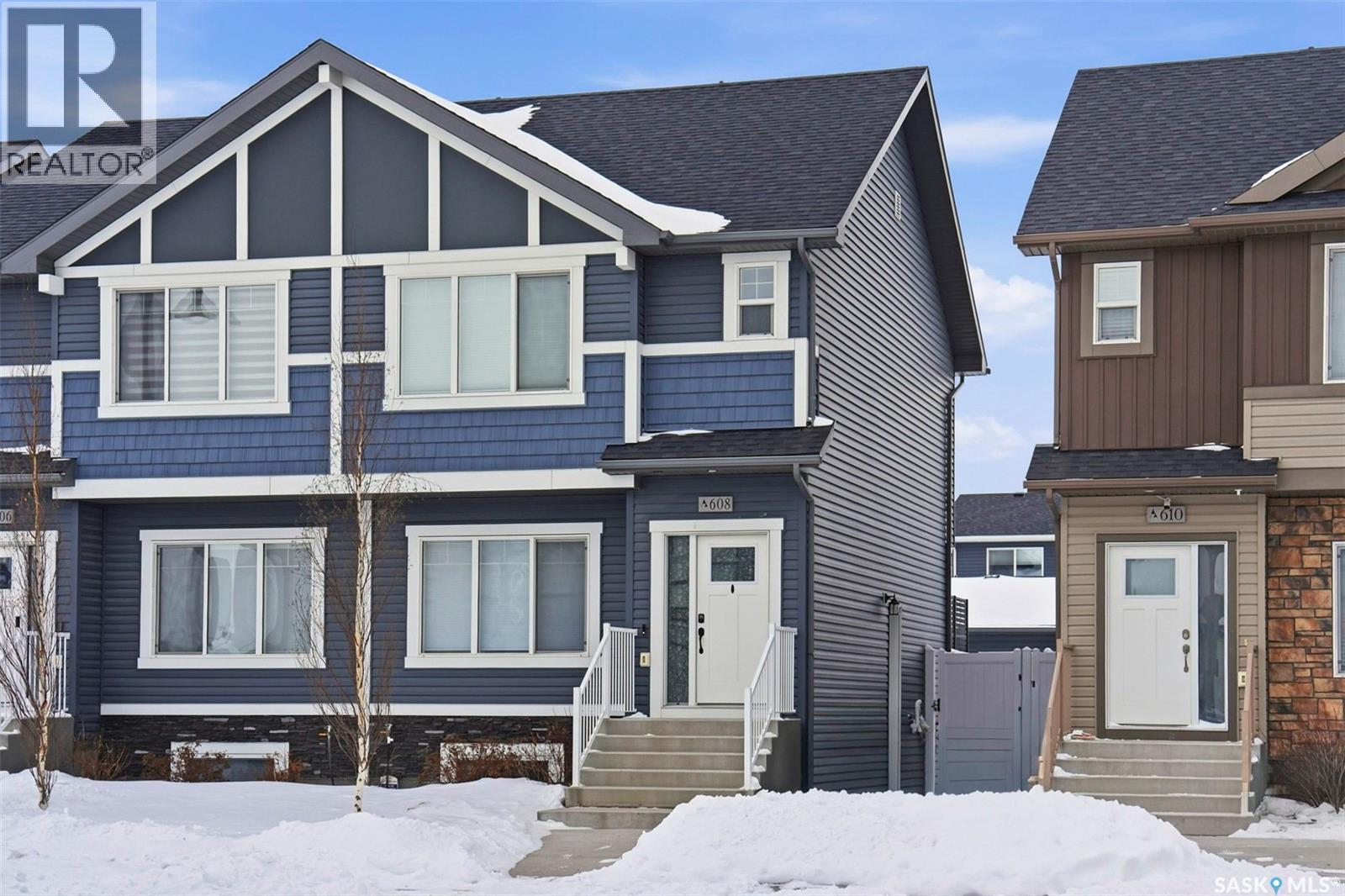 608 Brighton Gate, Saskatoon, SK - Outdoor With Facade