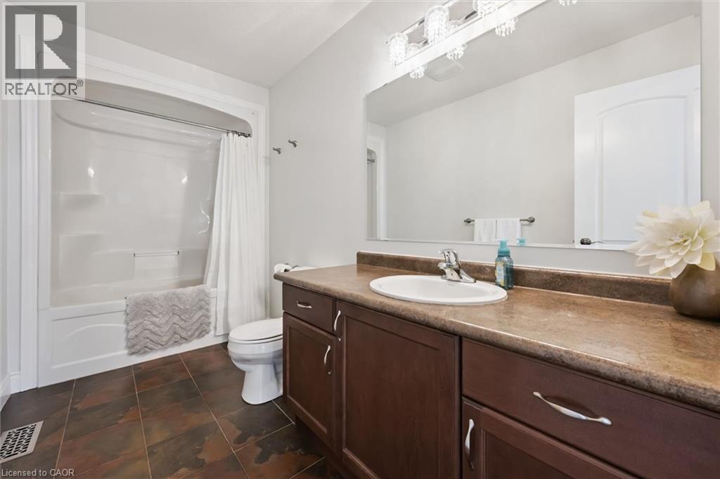 Full bathroom with vanity and shower / tub combo with curtain - 469 Woodbine Avenue, Kitchener, ON - Indoor Photo Showing Bathroom