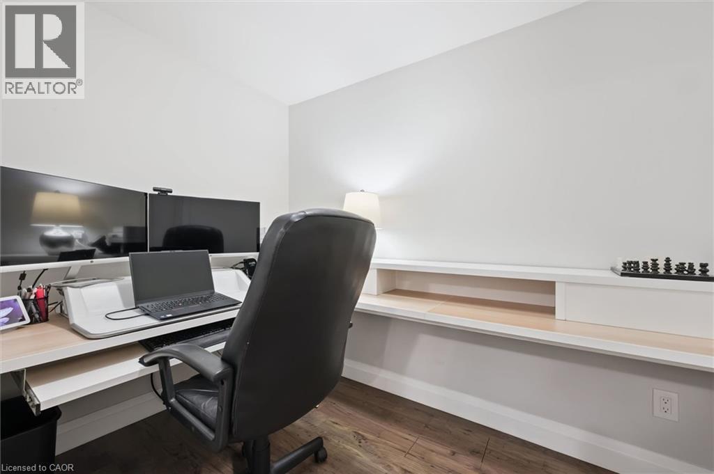 Office area featuring dark wood-type flooring and baseboards - 469 Woodbine Avenue, Kitchener, ON - Indoor Photo Showing Office