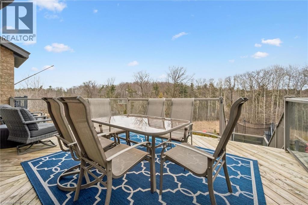 Deck with outdoor dining area - 469 Woodbine Avenue, Kitchener, ON - Outdoor With Deck Patio Veranda