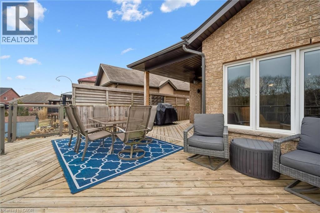 Deck with outdoor dining space and area for grilling - 469 Woodbine Avenue, Kitchener, ON - Outdoor With Deck Patio Veranda With Exterior