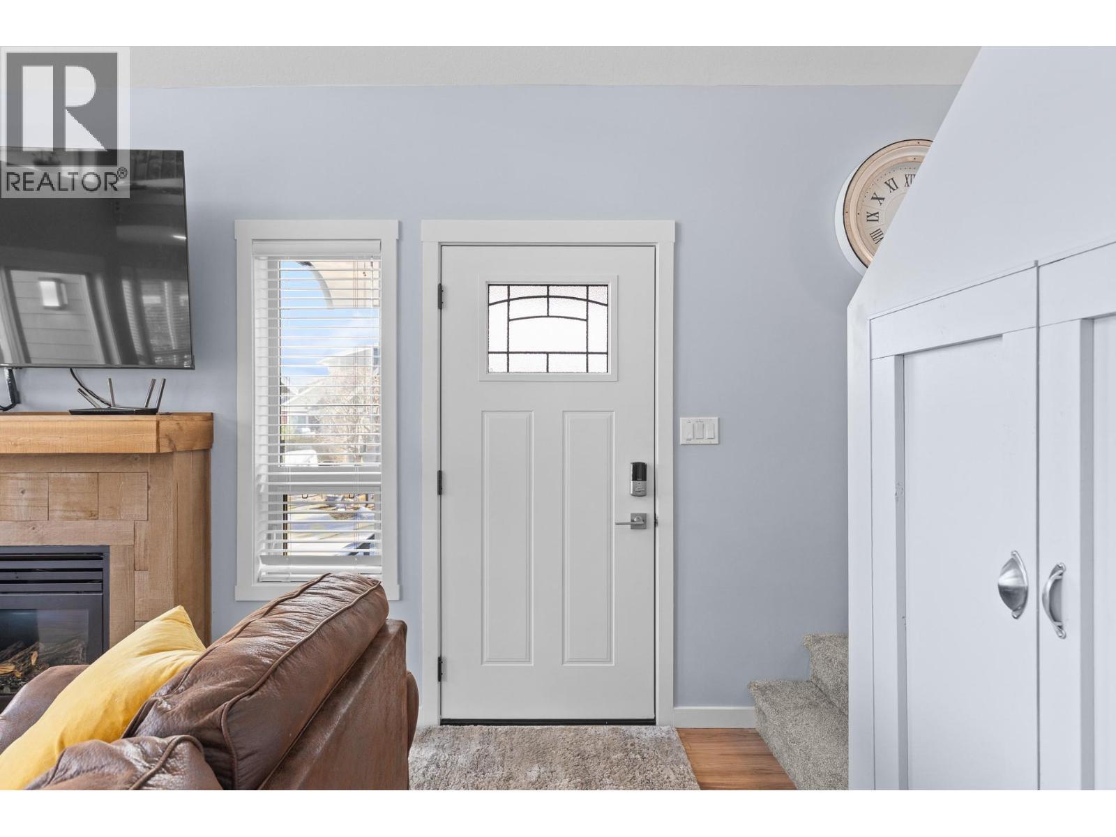 6844 Santiago Loop, Kelowna, BC - Indoor With Fireplace